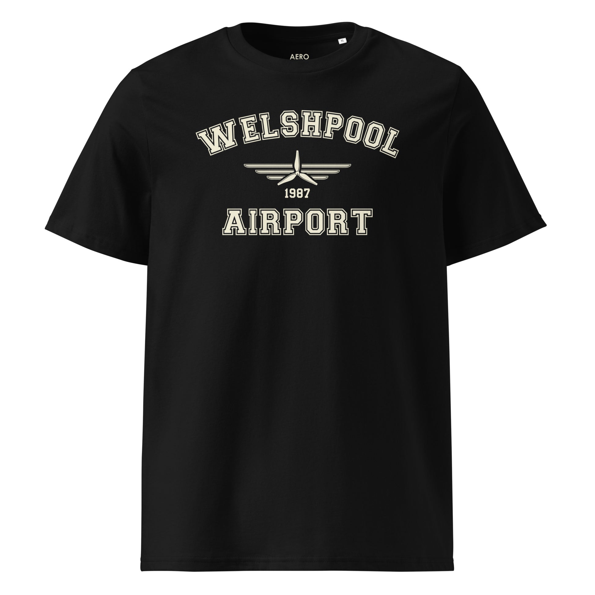 Welshpool Airport Classic Collegiate Unisex Organic Cotton T-Shirt in black with a vintage pale cream print that includes a propeller icon with the date of construction.