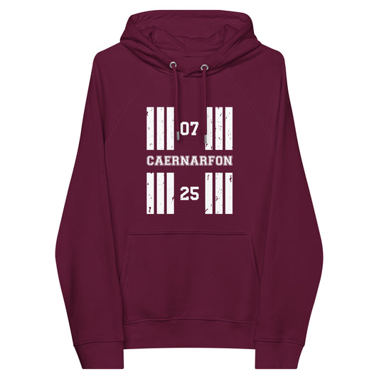 Burgundy coloured Caernarfon Airport runway designator raglan hoodie features a print with the airport's name and designator framed by stylised distressed threshold markings.