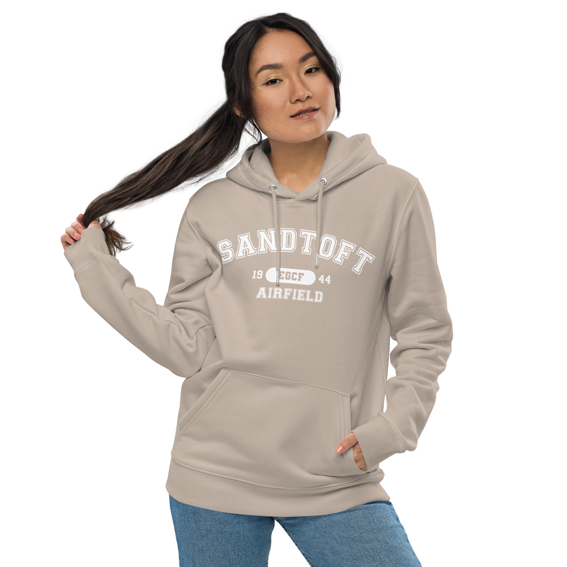 Coloured in a pale sand the Sandtoft Airfield heavyweight hoodie features a classic collegiate style print with the airport's name, ICAO code and date of construction on the front.