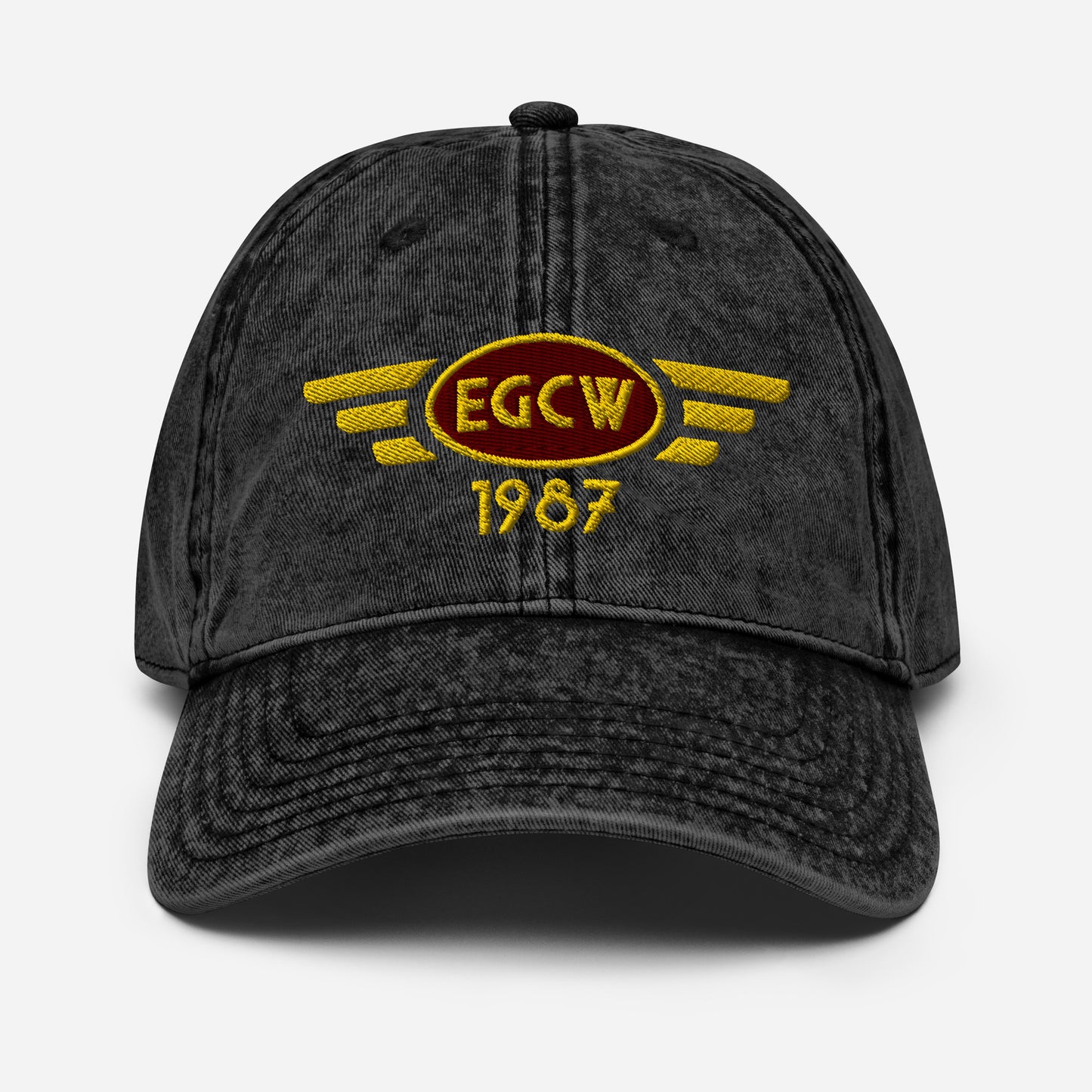 Welshpool Airport vintage cotton twill baseball cap with embroidered ICAO code.