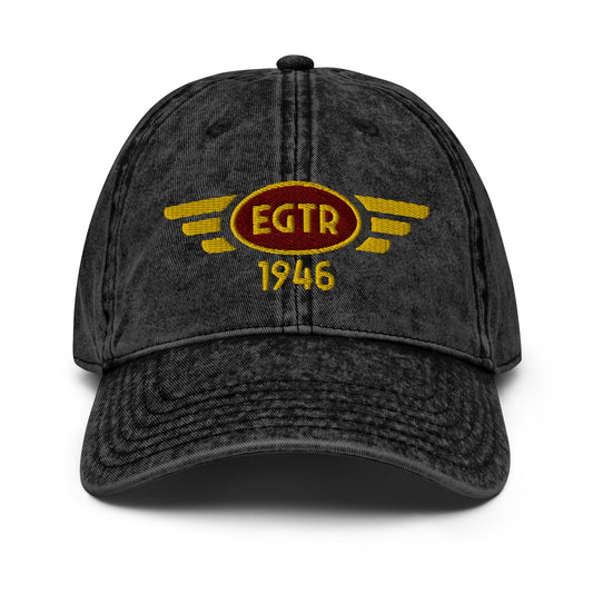 Black cotton twill baseball cap with embroidered vintage style aviation logo for Elstree Aerodrome.