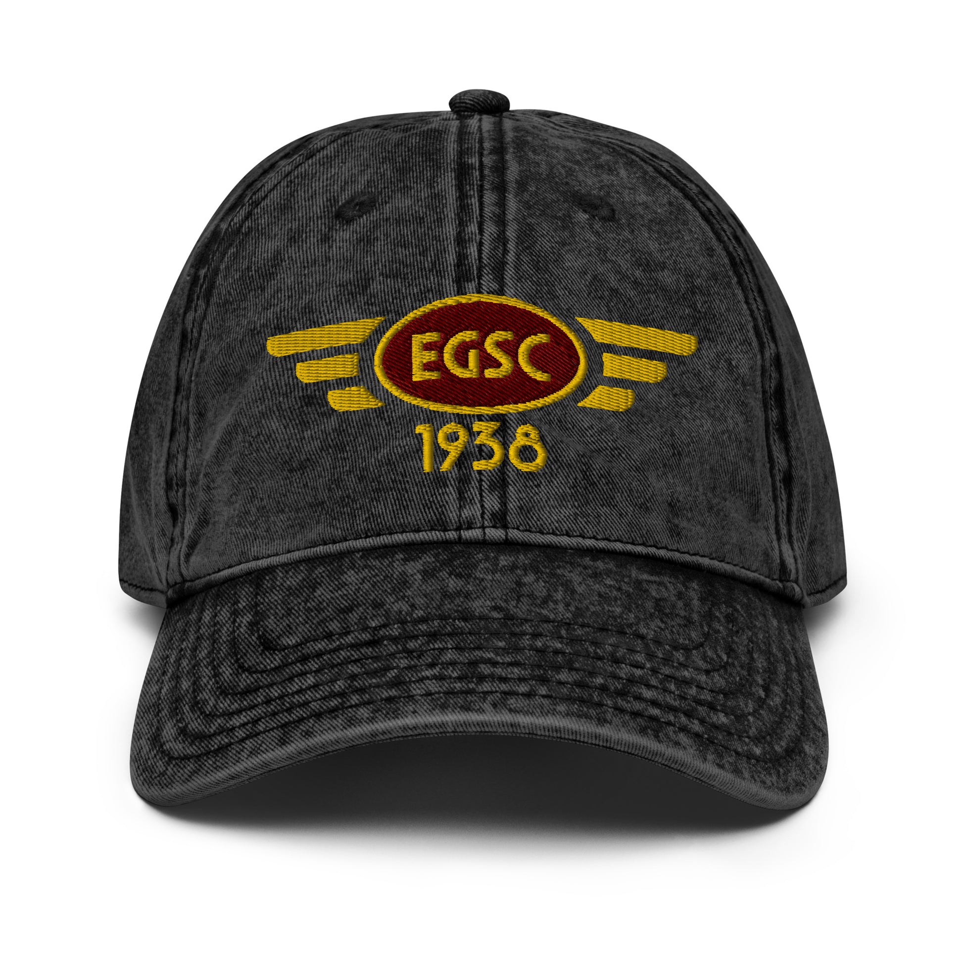 Black cotton twill baseball cap with embroidered vintage style aviation logo for Cambridge Airport.