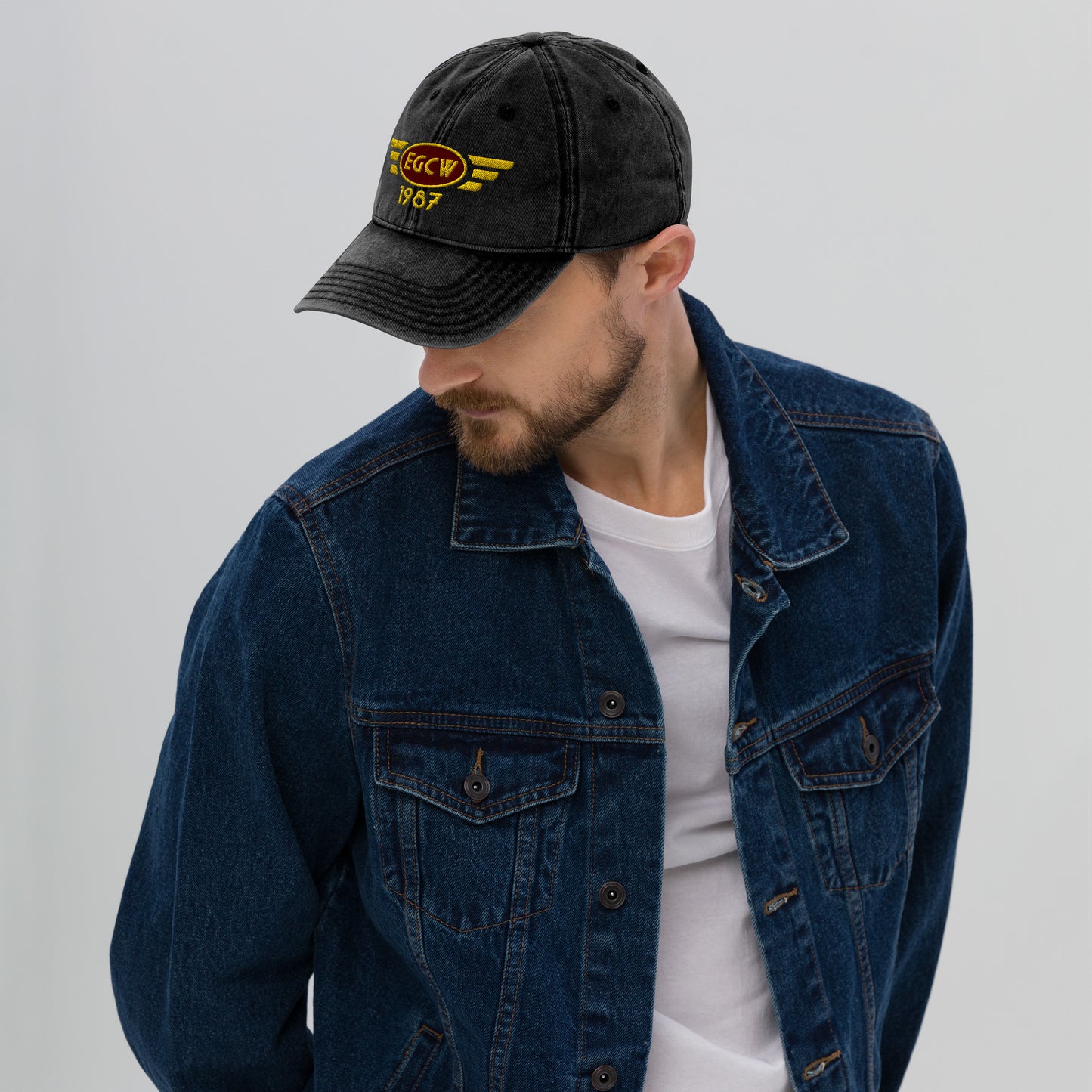 Welshpool Airport vintage cotton twill baseball cap with embroidered ICAO code.
