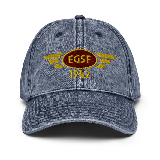 Blue cotton twill baseball cap with embroidered vintage style aviation logo for Conington Airport.