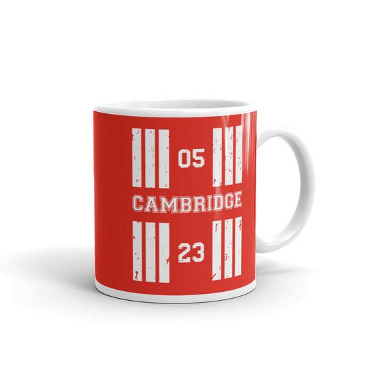 The Cambridge Airport 11oz runway designator mug features a red print with the airport's name and designator numbers framed by stylised threshold markings showing through.